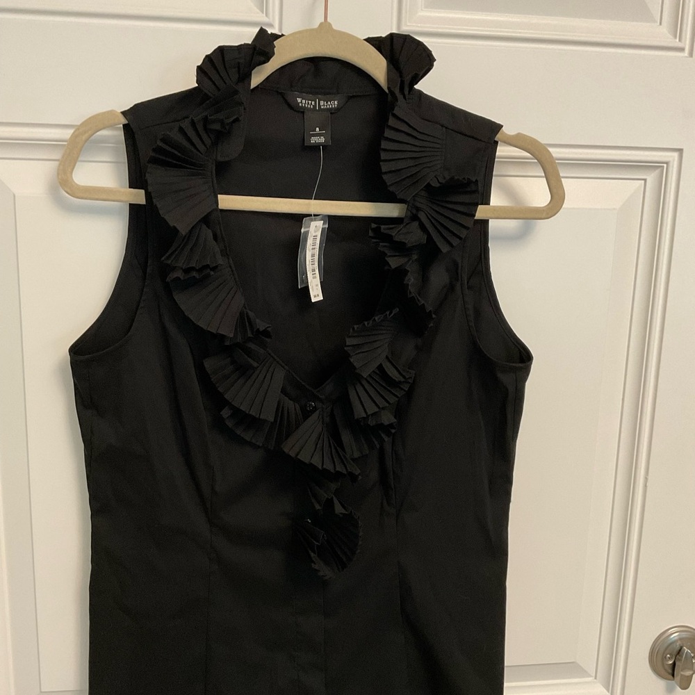 White House Black Market ruffle sleeveless button down top. Size 8